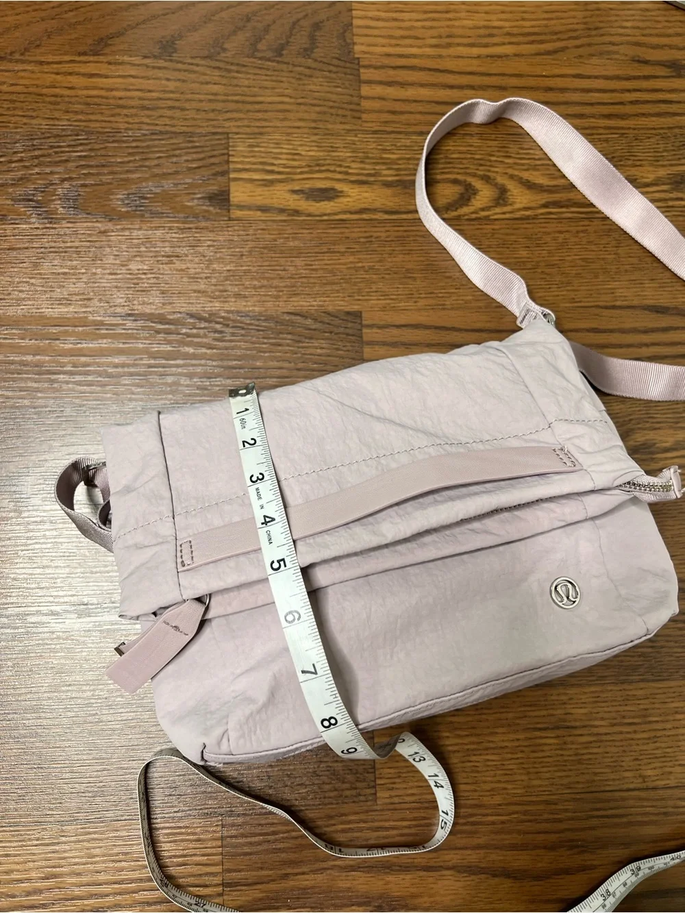 Lululemon On My Level Crossbody Bag in a light purple shade